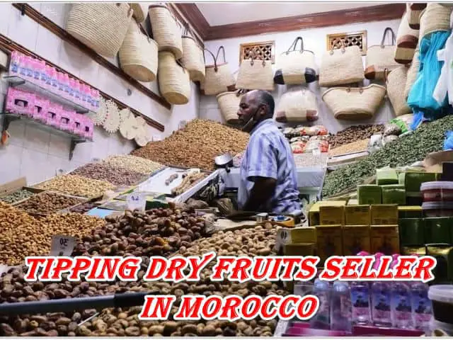 Tipping dry fruits seller in Morocco